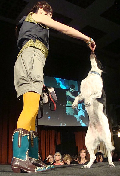 Johnna Wells and her dog Oliver on the runway